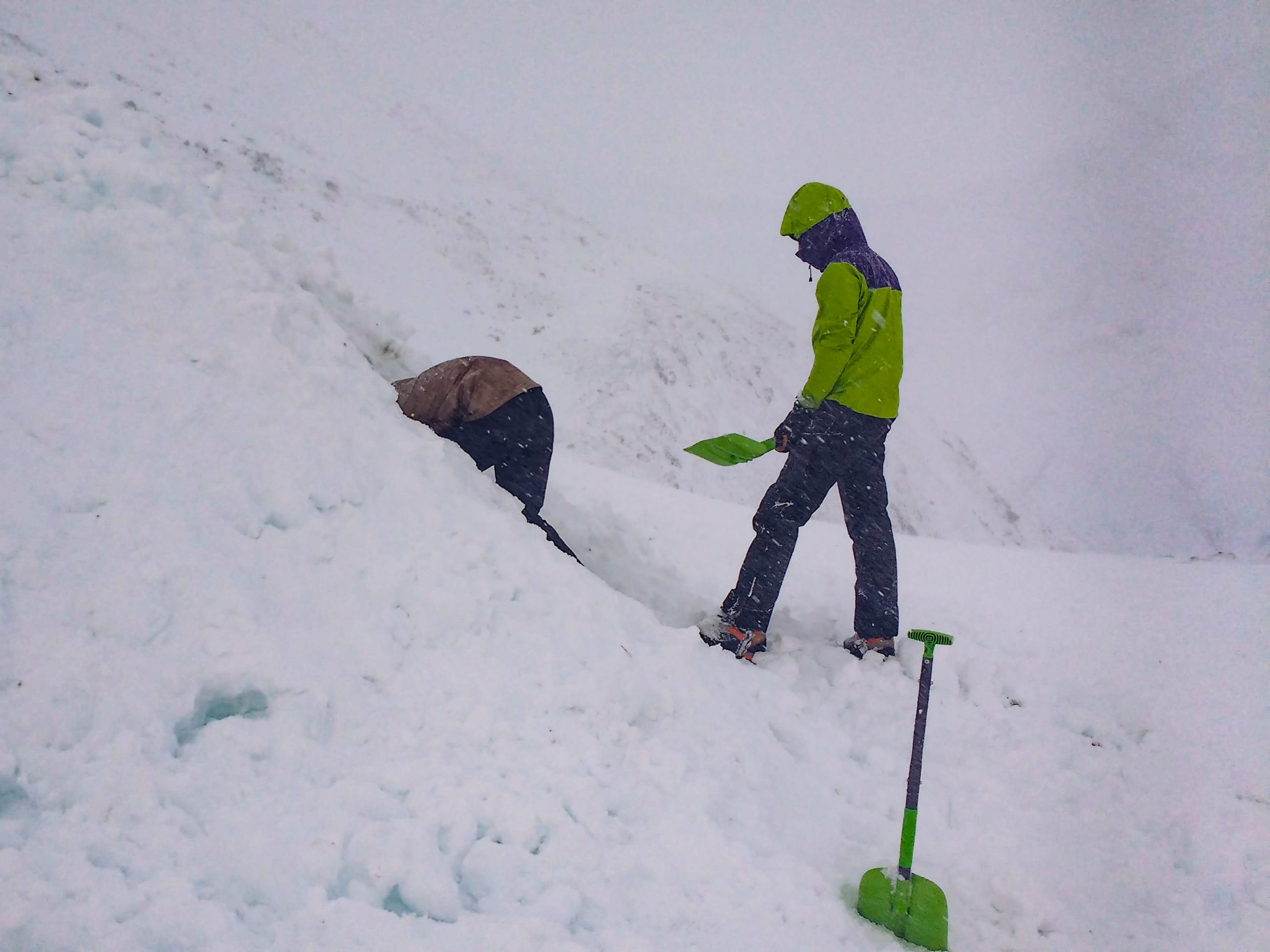 Digging a snow shelter