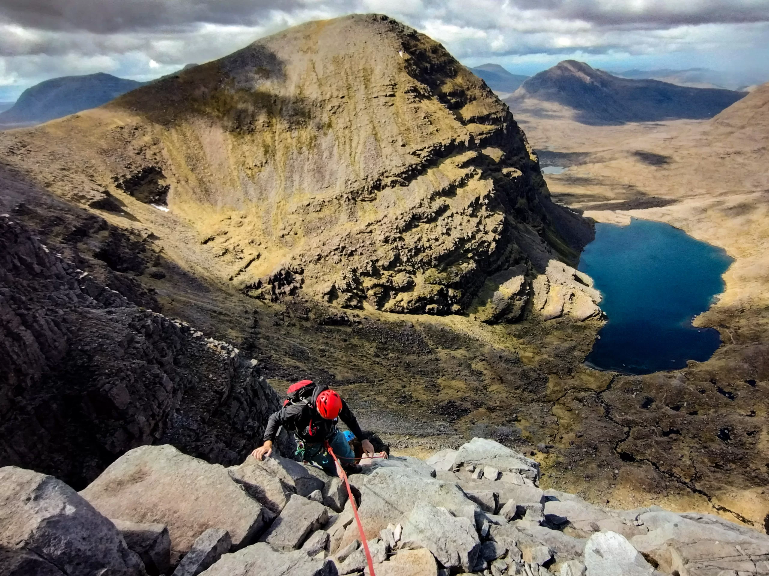 Reaching the top of East Buttress with the Flowerdale Estate in the background.