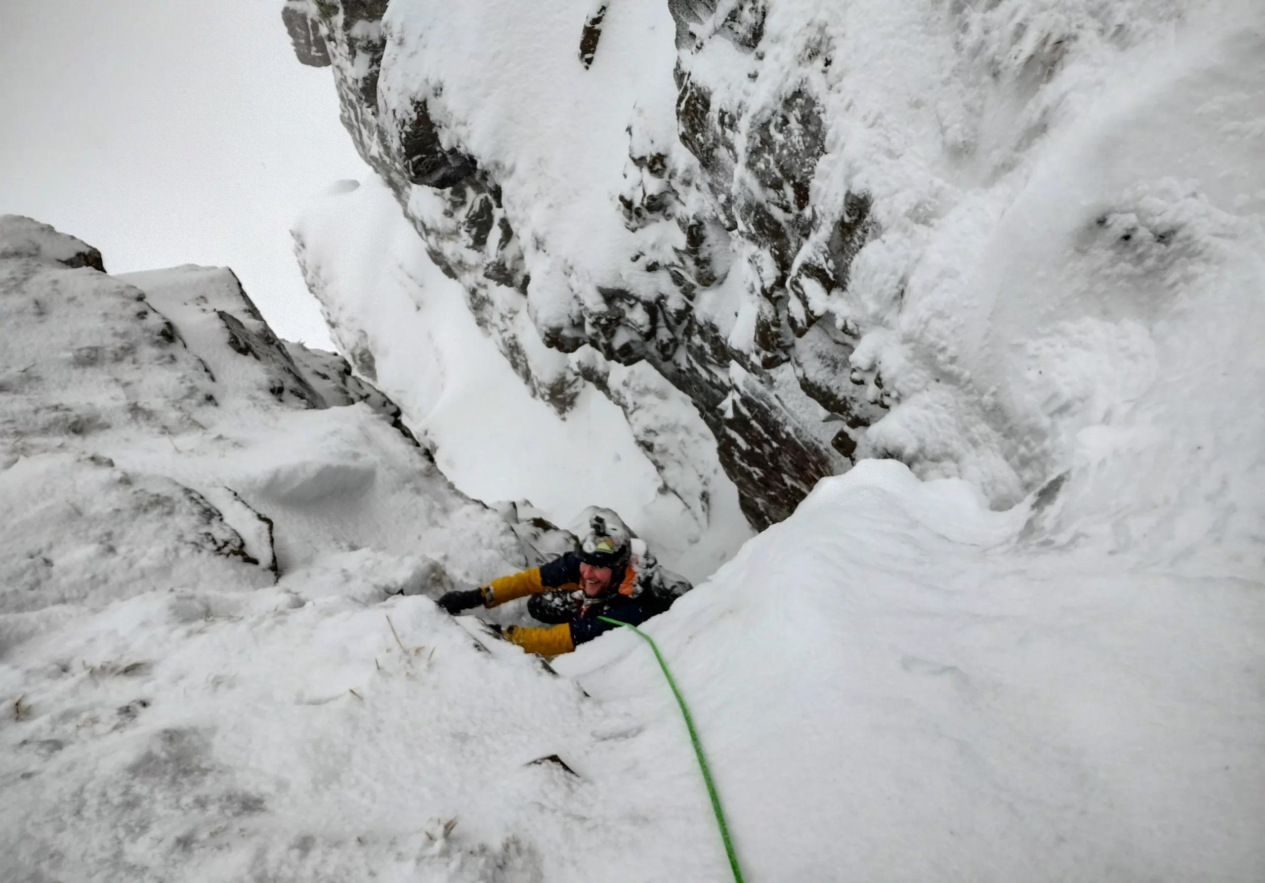 Climber smiling on a winter climb