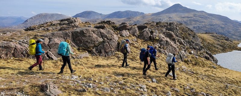 Group walking on their Mountain Leader Assessment Exped.