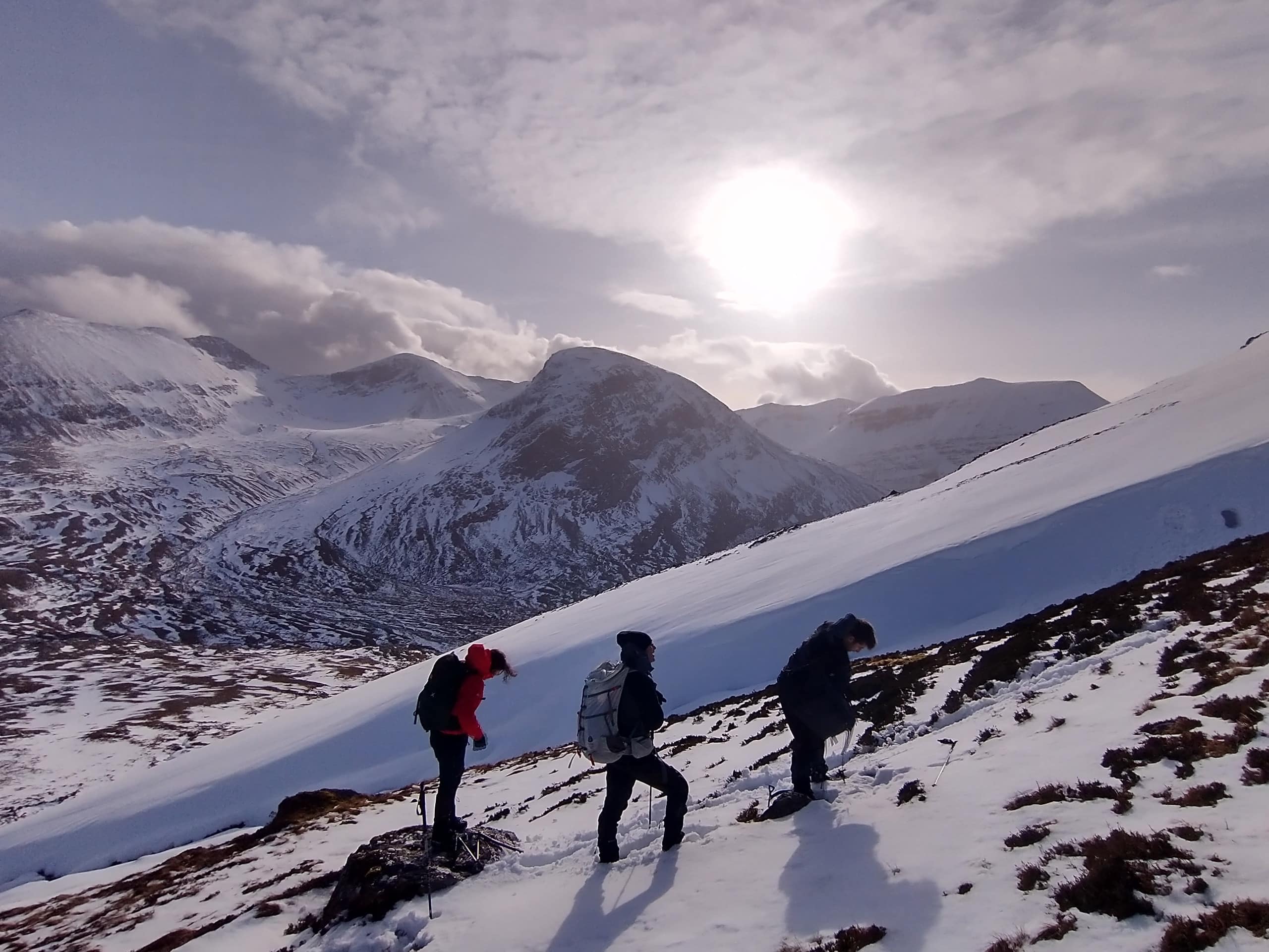 Clients admire the view after building emergency shelters
